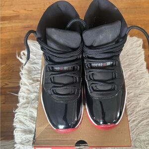 Air Jordan 11 Retro “Bred” 2019 – Size 10.5 (8/10 Condition, OG Classic)